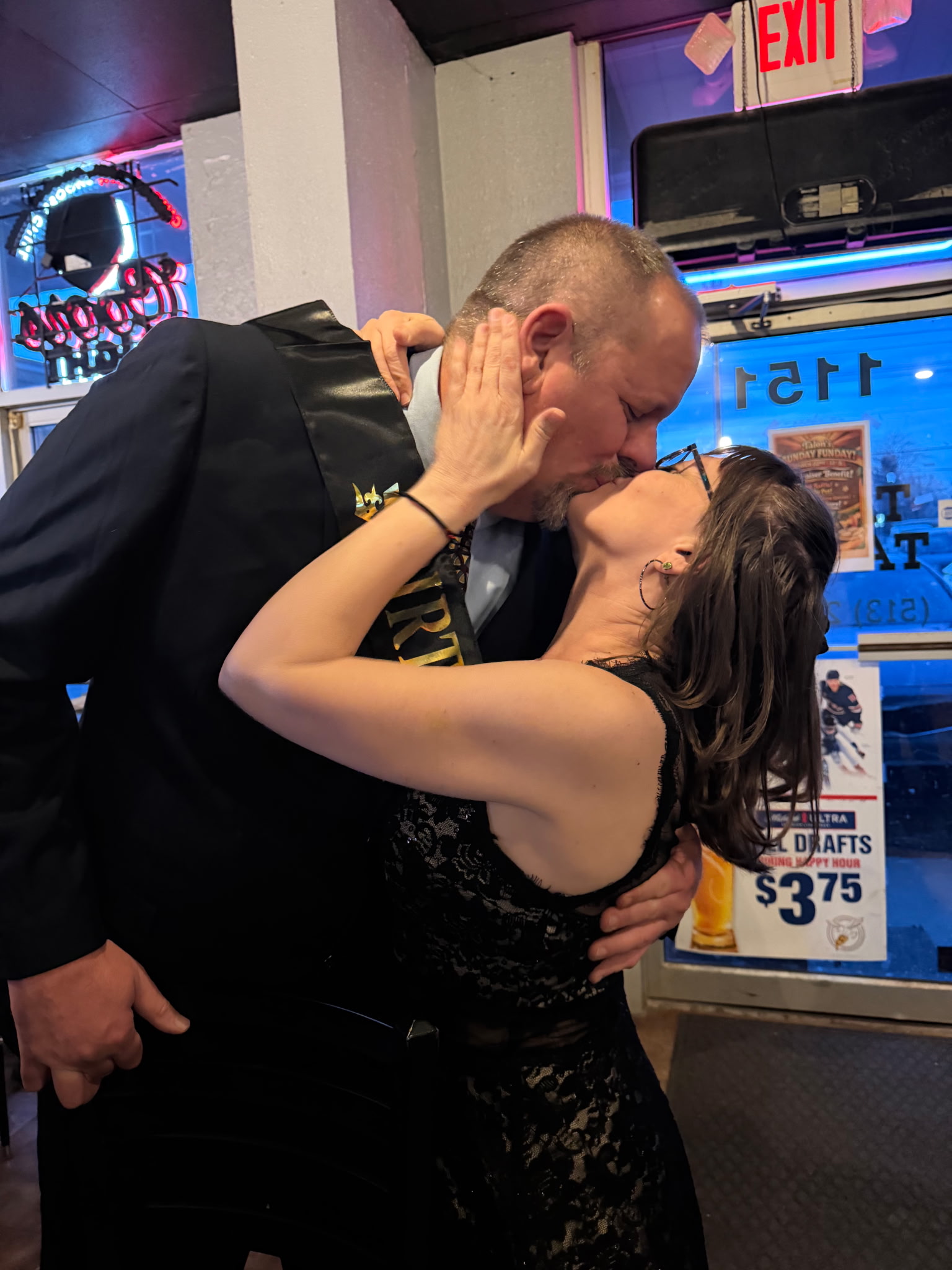 Corina and Geoff Kissing
